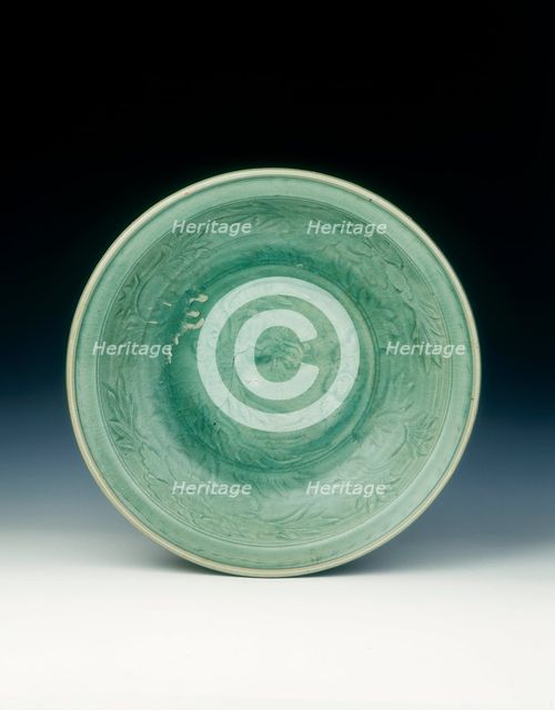 Shichikan celadon dish with phoenix and peonies, Ming dynasty, China, 16th century. Artist: Unknown