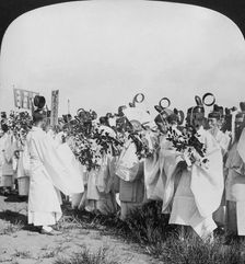 Shinto priests in a funeral procession for Hitachi Maru victims, Tokyo, Japan, 1905. Artist: HC White