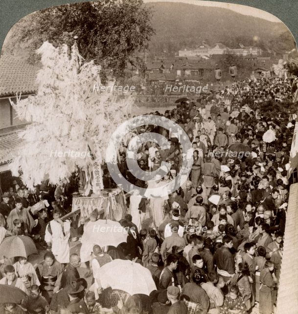 Shinto procession carrying sacred objects over a bridge to the Imperial Museum, Kyoto, Japan, 1904.Artist: Underwood & Underwood