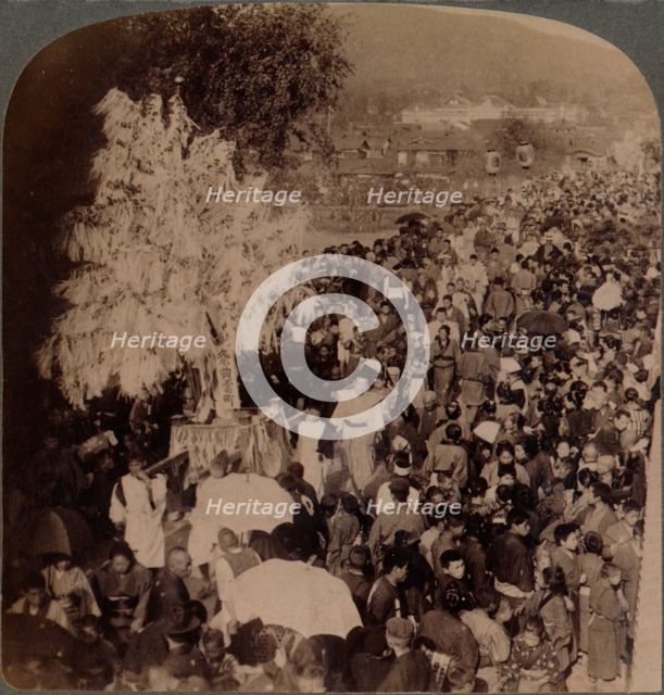 ''Shinto procession carrying sacred objects over bridge to Imperial Museum, Kyoto, Japan', 1904. Artist: Unknown.