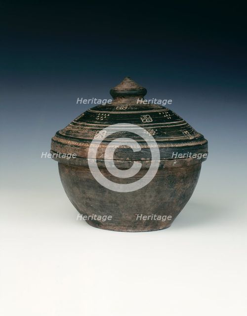 Shiny black circular pottery basin and cover, Han dynasty, China, 206 BC-220 AD. Creator: Unknown.