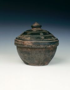 Shiny black circular pottery basin and cover, Han dynasty, China, 206 BC-220 AD. Creator: Unknown