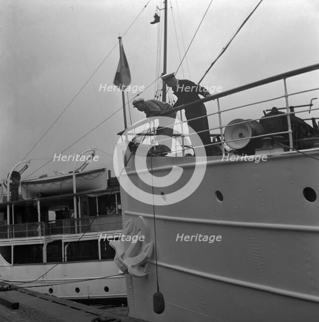 Ship by a quay, Stockholm harbour, Sweden, 1960. Artist: Torkel Lindeberg