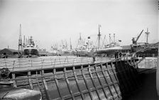 Shipping in the East Branch Dock at Tilbury, Essex, c1945-c1965. Artist: SW Rawlings