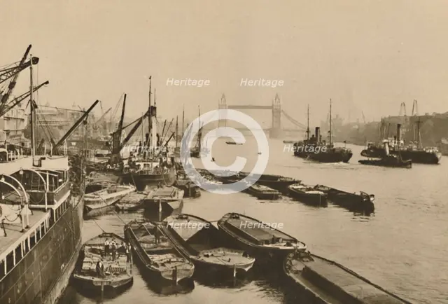 'Shipping in the Pool of London: A Vista from London Bridge to Tower Bridge', c1935. Creator: Donald McLeish.