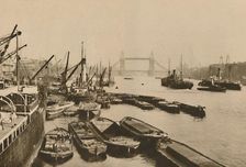 Shipping in the Pool of London: A Vista from London Bridge to Tower Bridge c1935. Creator: Donald McLeish