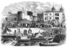 Shipping munitions of war at the Tower for Canada, 1861. Creator: Smyth