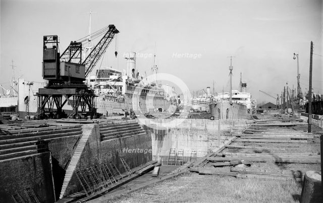 Shipping undergoing repair and overhaul, Tilbury, Essex, c1945-c1965.  Artist: SW Rawlings