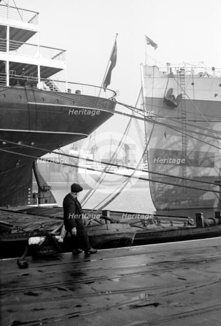 Ships berthed at the Royal Albert Dock, Canning Town, London, c1945-c1965. Artist: SW Rawlings