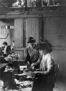 Shoe factories, Lynn, Mass.: 2 women working in shoe factory, (1895?). Creator: Frances Benjamin Johnston