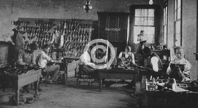 Shoe shop making and repairing, 1904. Creator: Frances Benjamin Johnston.