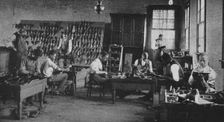 Shoe shop making and repairing, 1904. Creator: Frances Benjamin Johnston