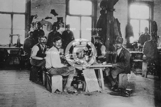 Shoe shop of Y.M.C.A. -- Siberian Prison Camp, between c1915 and c1920. Creator: Bain News Service.
