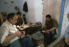 Shoemakers in a Tunisian souk