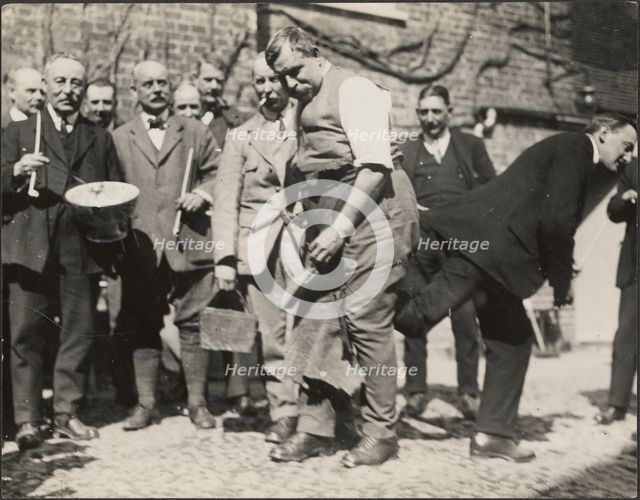 'Shoeing the Colts' ceremony during the Hocktide Festival in Hungerford, West Berkshire, 1925-1935. Creator: George R Long.