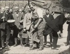 Shoeing the Colts ceremony during the Hocktide Festival in Hungerford, West Berkshire, 1925-1935. Creator: George R Long