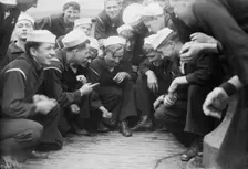 Shooting craps on NEW YORK, between c1910 and c1915. Creator: Bain News Service