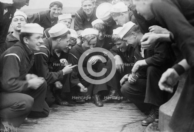 Shooting craps on NEW YORK, between c1910 and c1915. Creator: Bain News Service.