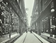 Shop windows, looking south from Cheapside, London, May 1912