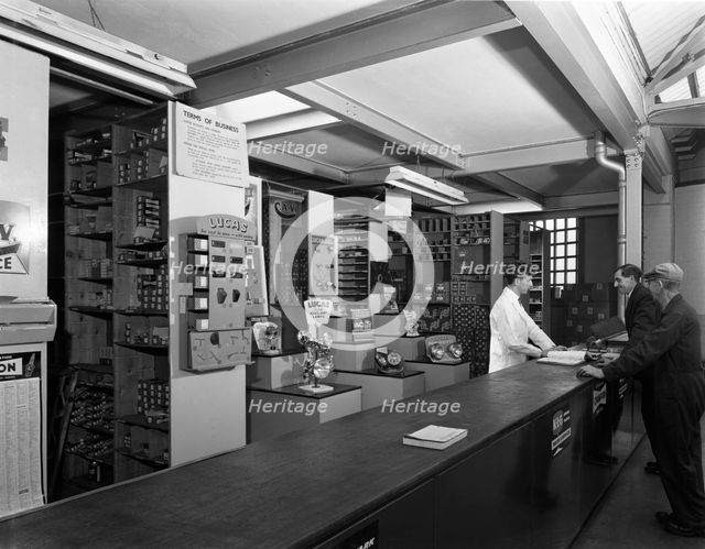 Shop counter, Globe & Simpson auto electrical engineers, Nottingham, Nottinghamshire, 1961.  Artist: Michael Walters