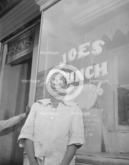 Shopper on Saturday afternoon, Washington, D.C., 1942. Creator: Gordon Parks.