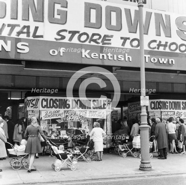 Shoppers attending a closing down sale at a shop in Kentish Town, London, c1970. Artist: Henry Grant