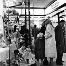 Shoppers window shopping in London, c1960