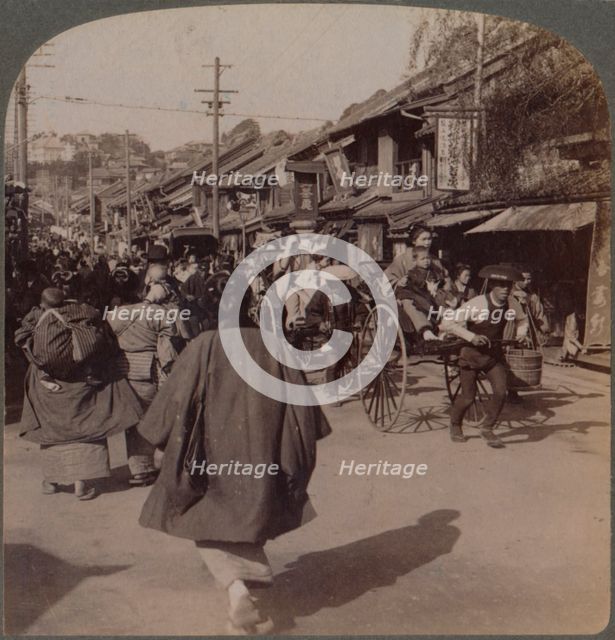 'Shops and crowds on Batsumati Street, in the native quarter, Yokohama, Japan', 1904. Artist: Unknown.
