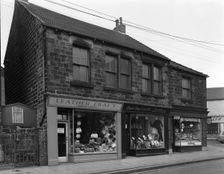 Shops in Bank Street, Mexborough, South Yorkshire, 1963. Creator: Michael Walters