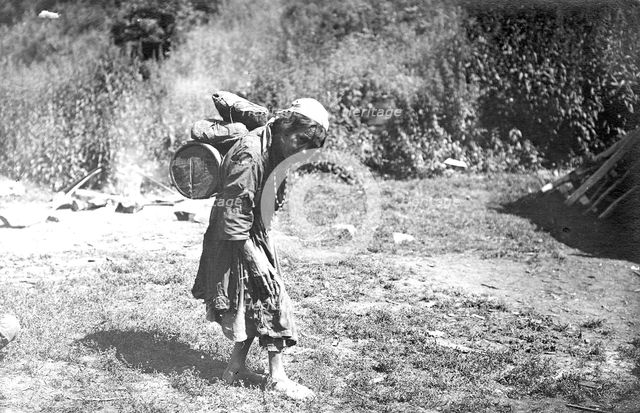 Shoria Woman Carrying a Load, 1913. Creator: GI Ivanov.