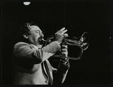 Shorty Rogers playing the flugelhorn, Hemel Hempstead, Hertfordshire, 1983. Artist: Denis Williams