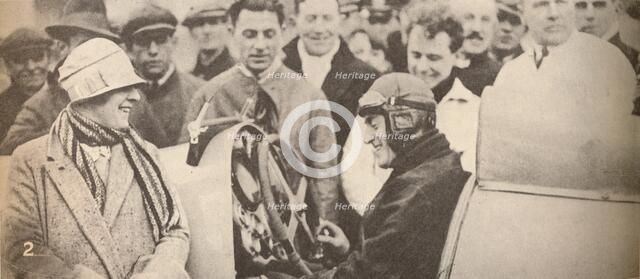 'Showing the driving mechanism to interested spectators', c1927, (1935). Artist: Unknown.