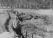 Showing civilians round the exhibition trenches on the outskirts of Berlin 1915
