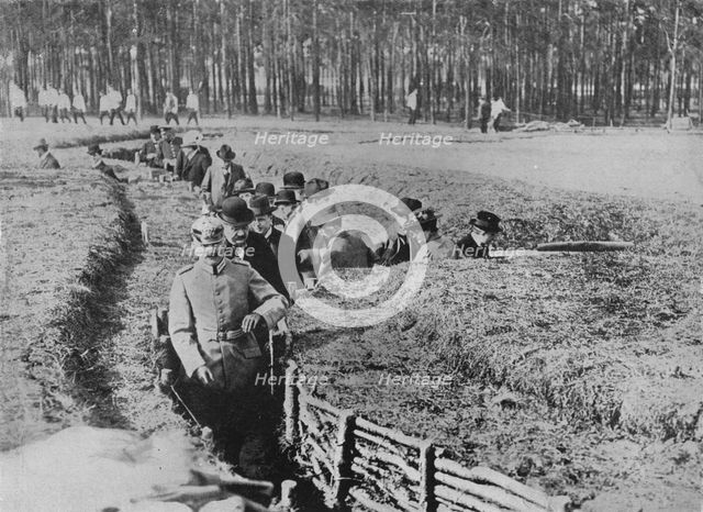 'Showing civilians round the exhibition trenches on the outskirts of Berlin', 1915. Artist: Unknown.