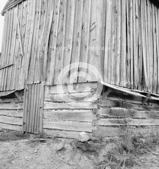 Showing construction of tobacco barn, Person County, North Carolina, 1939. Creator: Dorothea Lange.