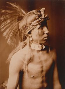 Shows As He Goes, half-length portrait, c1905. Creator: Edward Sheriff Curtis