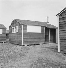 Shows new type of wooden shelter for migratory workers, FSA camp, near McMinnville, Oregon, 1939. Creator: Dorothea Lange