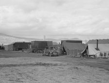 Shows pickers tents, power unit and shower bath..., FSA camp, Merrill, Klamath County, Oregon, 1939 Creator: Dorothea Lange