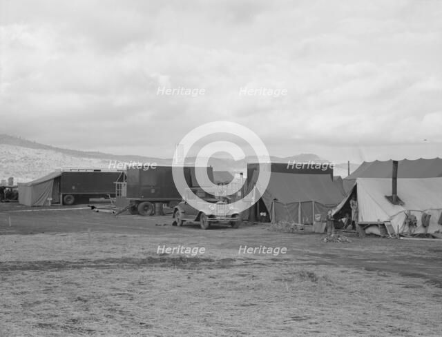Shows pickers' tents, power unit and shower bath..., FSA camp, Merrill, Klamath County, Oregon, 1939 Creator: Dorothea Lange.