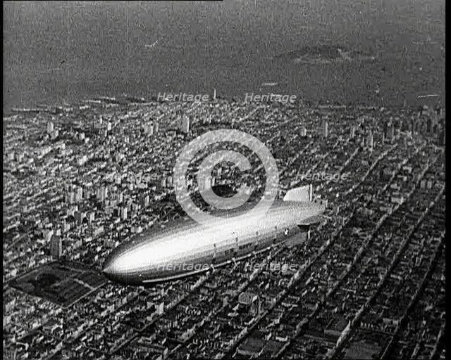 Shot of a Zeppelin Flying Over Manhattan, 1932. Creator: British Pathe Ltd.