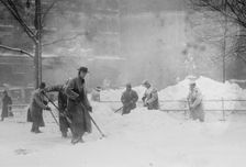 Shovelling snow in City Hall Park, New York, 1910. Creator: Bain News Service