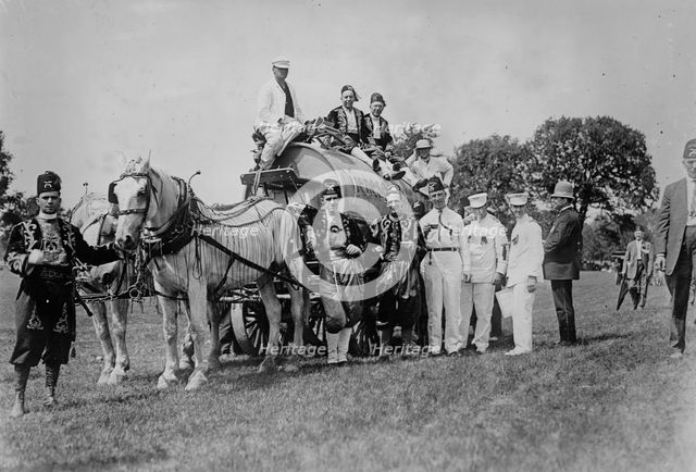 Shriners on water wagon, Rochester, between c1910 and c1915. Creator: Bain News Service.