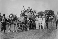 Shriners on water wagon, Rochester, between c1910 and c1915. Creator: Bain News Service