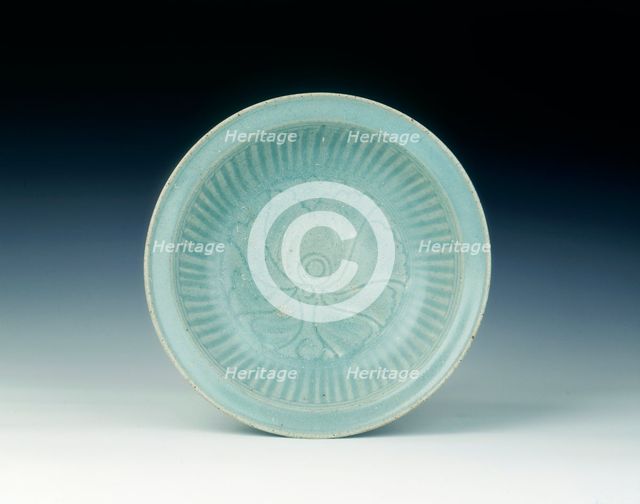 Si Satchanalai celadon dish with carved peony and fluted decoration, Thailand, 14th-15th century. Artist: Unknown