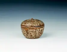 Si Satchanalai stoneware covered box of mangosteen shape, Thailand, 14th-15th century. Creator: Unknown