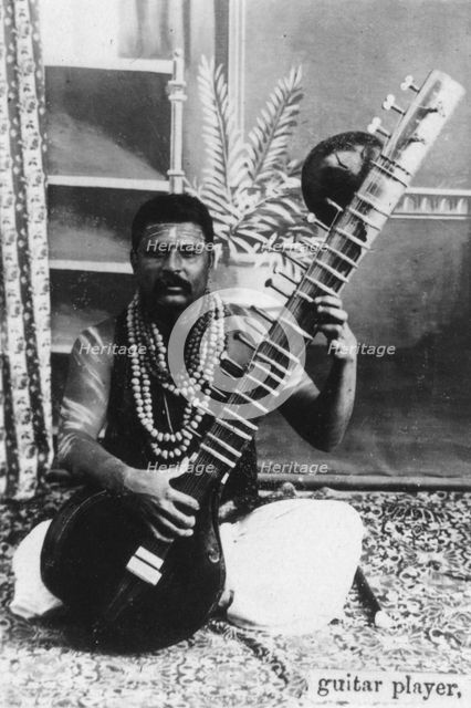 Sitar player, India, 20th century. Artist: Unknown