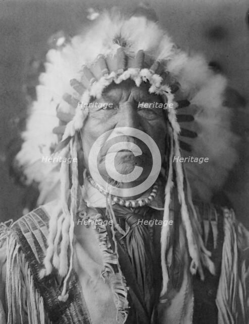 Sitting Bear-Arikara, c1908. Creator: Edward Sheriff Curtis.