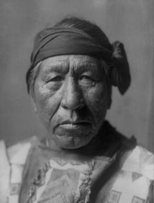 Sitting Owl-Hidatsa, c1908. Creator: Edward Sheriff Curtis