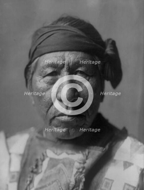 Sitting Owl-Hidatsa, c1908. Creator: Edward Sheriff Curtis.