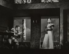 Sitting soldier and woman, 1938. Creator: Unknown